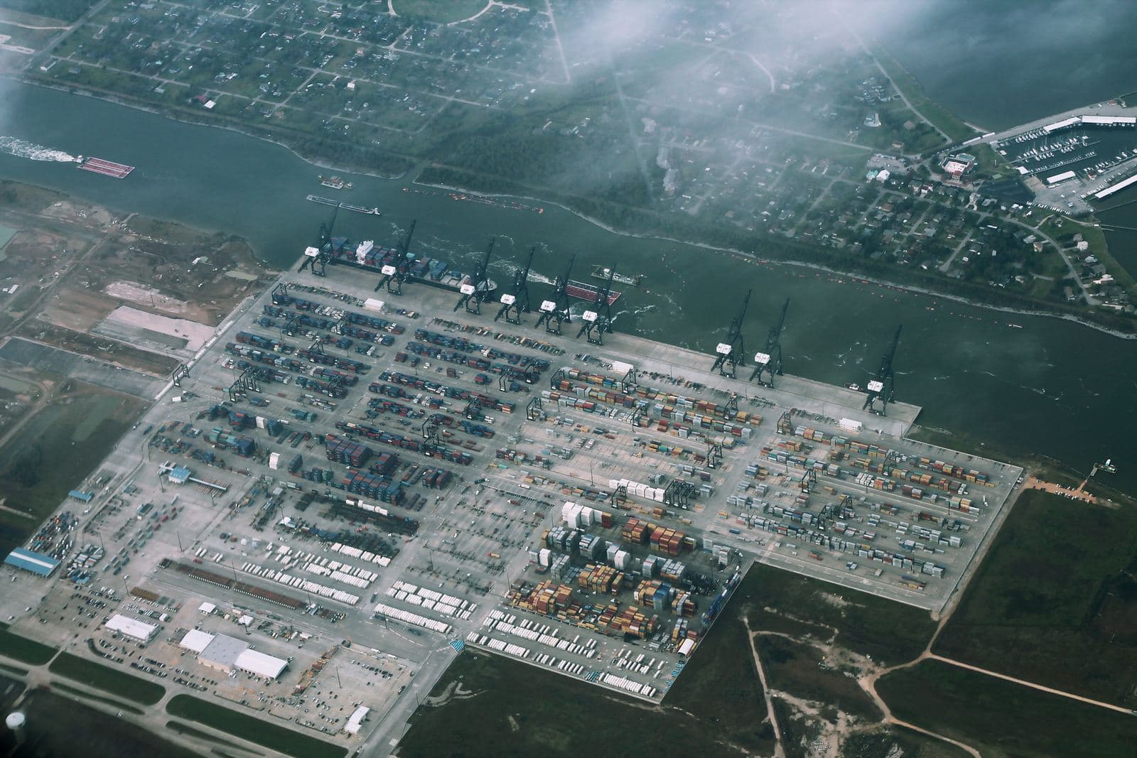 Aerial view of the Bayport Container Terminal near Houston, Texas, with ship-to-shore cranes and container stacks
